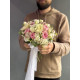 A delicate white and pink bridal bouquet of Mansfield Park peony roses, Mondial roses, white freesia, eustoma, ozothamnus, chamelacium, and eucalyptus (No. 19123)
