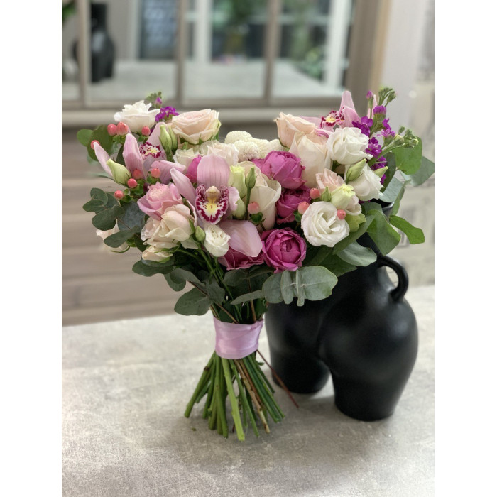 A modern bridal bouquet of orchids, peony roses, matthiola, hypericum, eustoma, and eucalyptus branches, No. 19127.