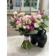 A modern bridal bouquet of orchids, peony roses, matthiola, hypericum, eustoma, and eucalyptus branches, No. 19127.