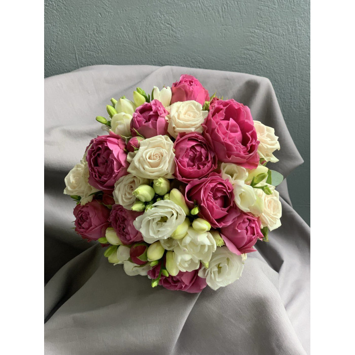 A vibrant bridal bouquet accented with a fuchsia peony rose #19113
